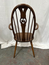 Load image into Gallery viewer, Vintage Ercol swan Windsor black carver chair
